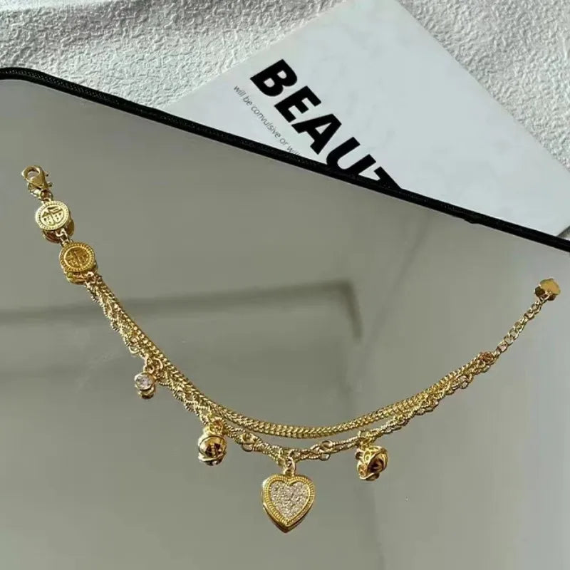 Gold Layered Heart With Bell Charms Bracelet