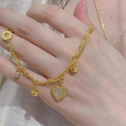 Gold Layered Heart With Bell Charms Bracelet