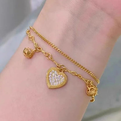 Gold Layered Heart With Bell Charms Bracelet